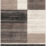 Geometric multi-shade rectangular area rug design.