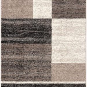 Geometric multi-shade rectangular area rug design.