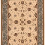 Traditional floral rug with intricate patterns and borders.