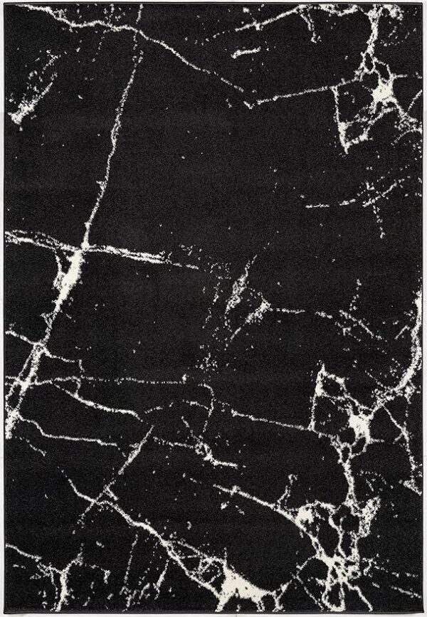 Black rug with white marble pattern design.