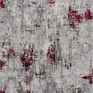 Abstract gray and red textured area rug.