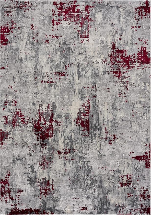 Abstract gray and red textured area rug.