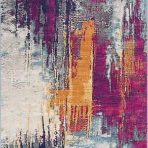 Colorful abstract rug with orange, pink, and blue patterns.