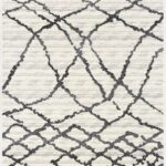 Abstract geometric pattern on gray area rug.