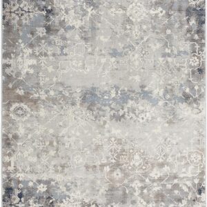 Abstract floral pattern area rug in neutral colors.