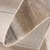 Close-up of textured beige carpet corner