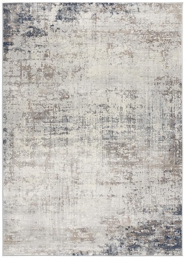 Abstract pattern area rug in neutral colors.
