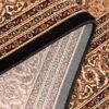 Detailed pattern of a Persian rug corner.