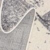 Gray and white textured woven carpet