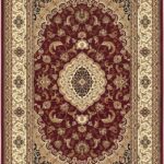 Ornate Persian rug with red and gold patterns.
