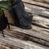 Textured rug with basket and plant decoration