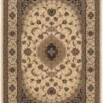 Intricate patterned beige and brown area rug.