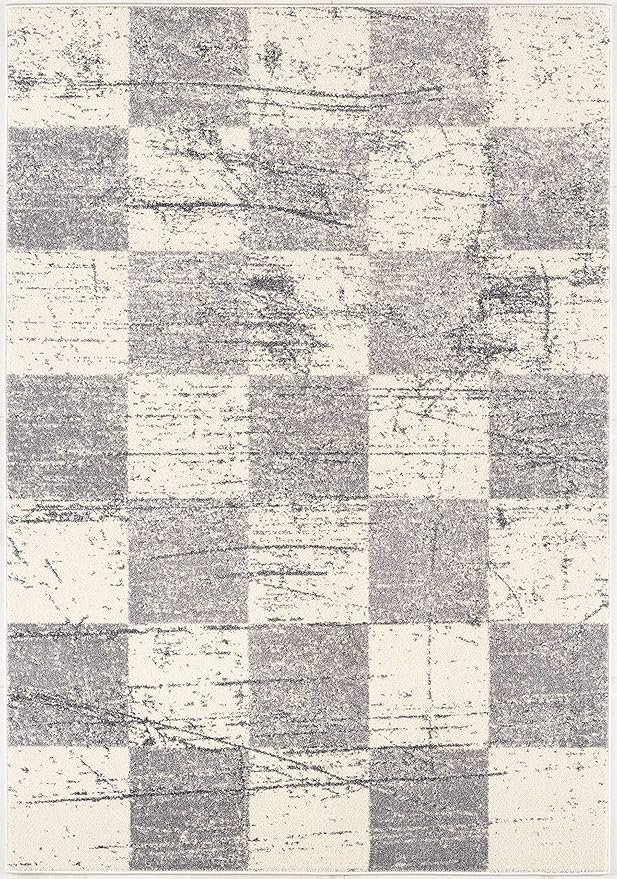 Modern checkered rug with abstract gray pattern.