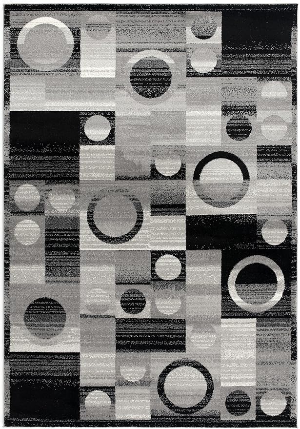 Geometric black and gray pattern rug with circles.