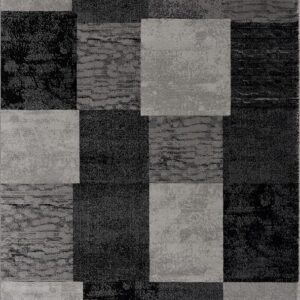 Abstract gray and black square patterned carpet.
