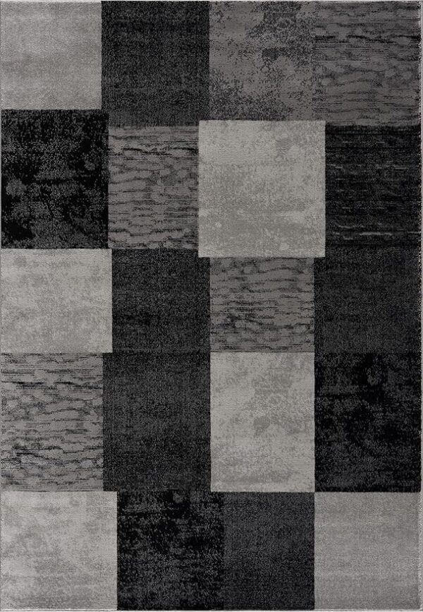 Abstract gray and black square patterned carpet.