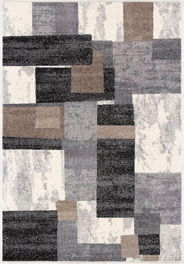 Abstract geometric pattern rug with gray, beige blocks.