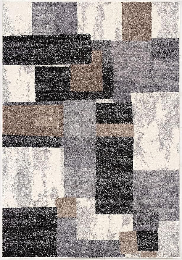 Abstract geometric pattern rug with gray, beige blocks.