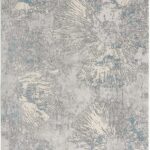 Gray and blue abstract patterned area rug.