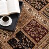 Coffee and book on patterned rug