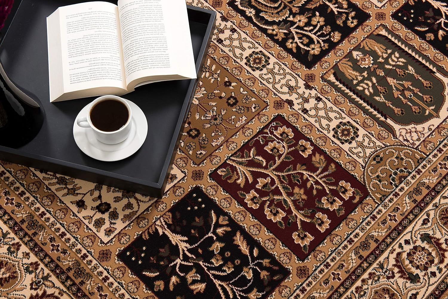 Coffee and book on patterned rug
