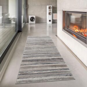 Striped rug on modern living room floor by fireplace.