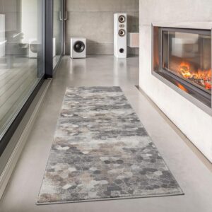 Modern living room with patterned rug and fireplace.