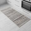 Striped kitchen rug on tiled floor
