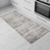 Textured kitchen runner on white floor tiles