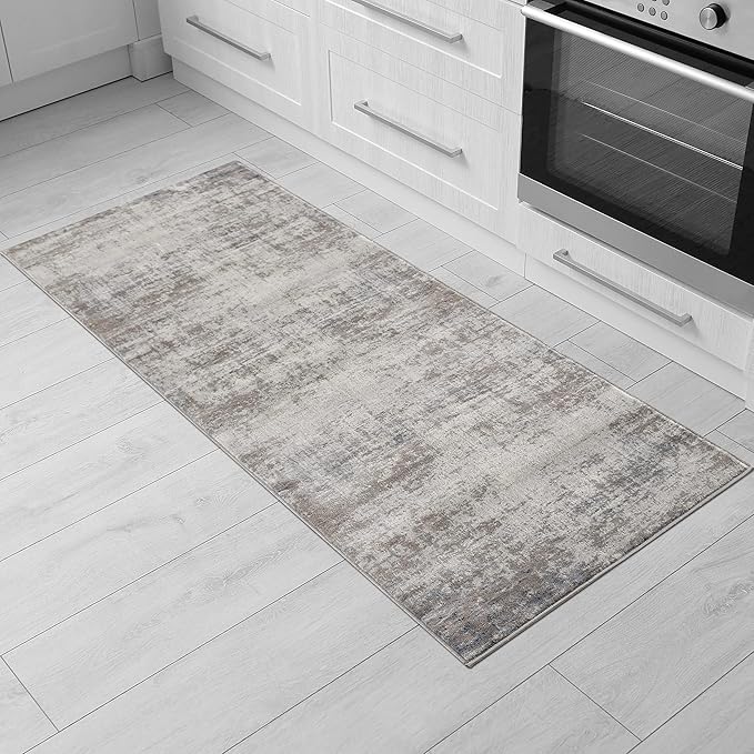 Textured kitchen runner on white floor tiles