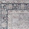 Detailed floral pattern on oriental rug corner.