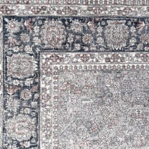 Detailed floral pattern on oriental rug corner.