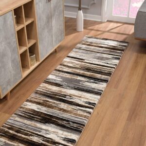 Striped hallway rug on wooden floor