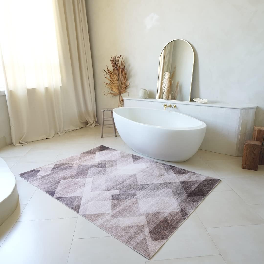 Modern bathroom with large geometric-patterned rug