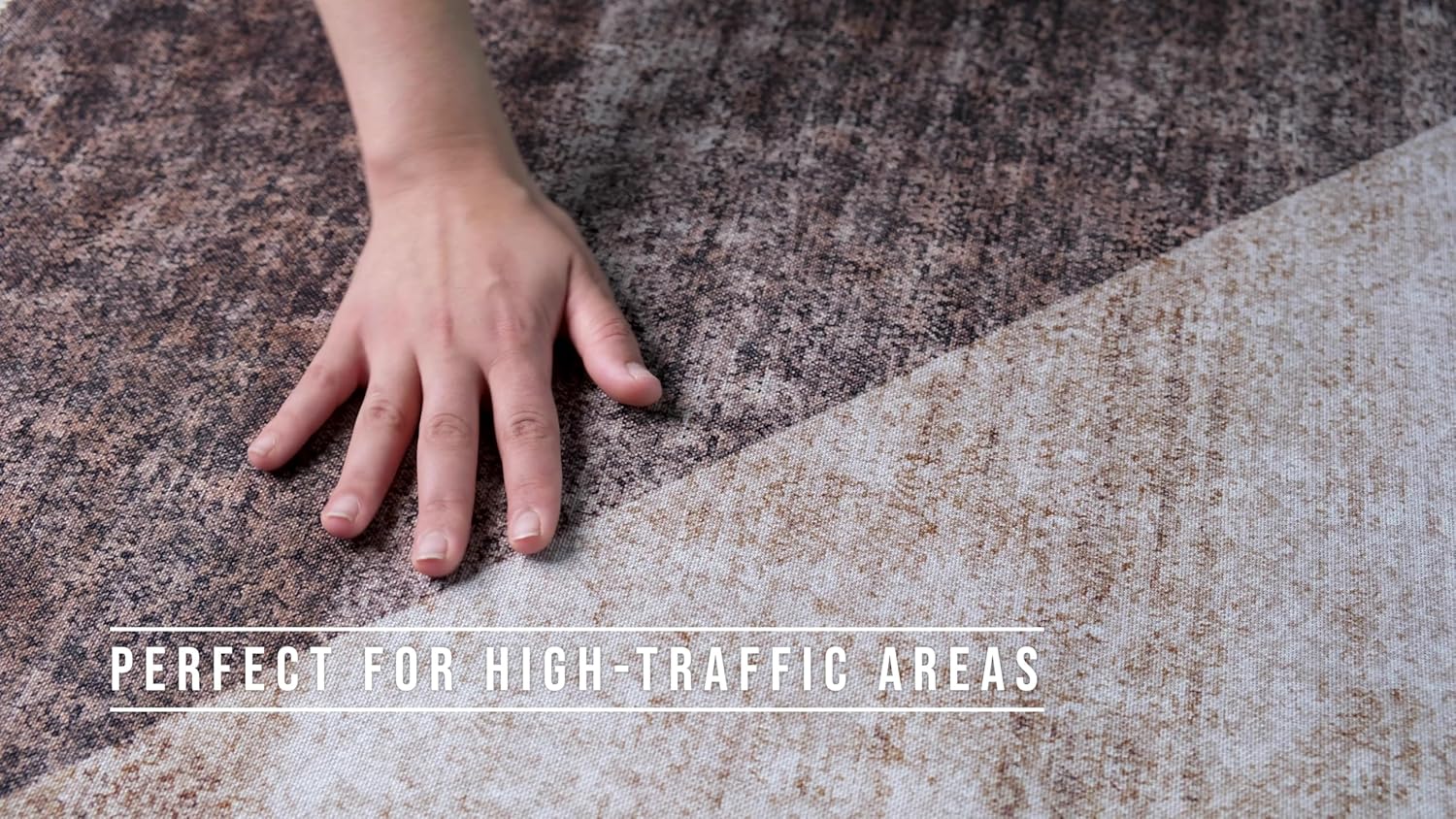 Hand touching durable carpet for high-traffic areas.