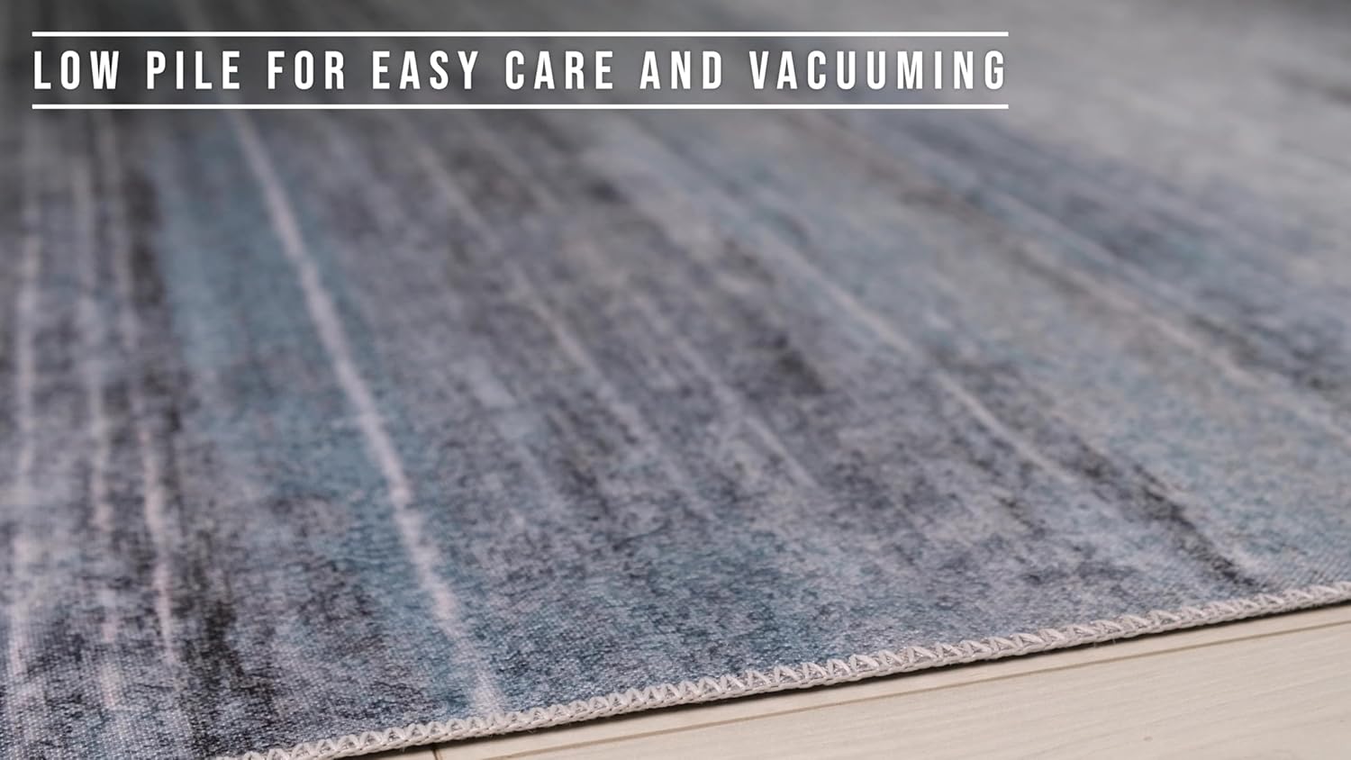 Close-up of blue low-pile carpet for easy care.