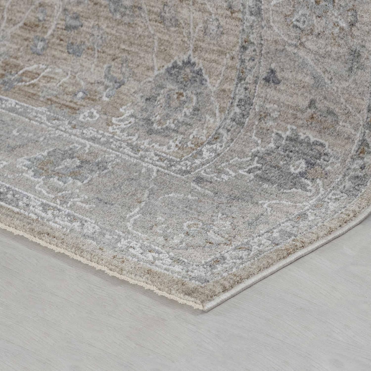 Close-up of intricate patterned rug on floor