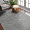 Modern living room with patterned gray carpet.