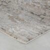 Beige textured area rug on light floor