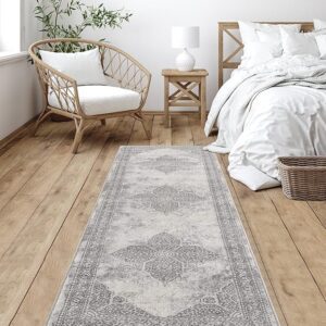 Cozy bedroom with patterned rug and wicker chair.