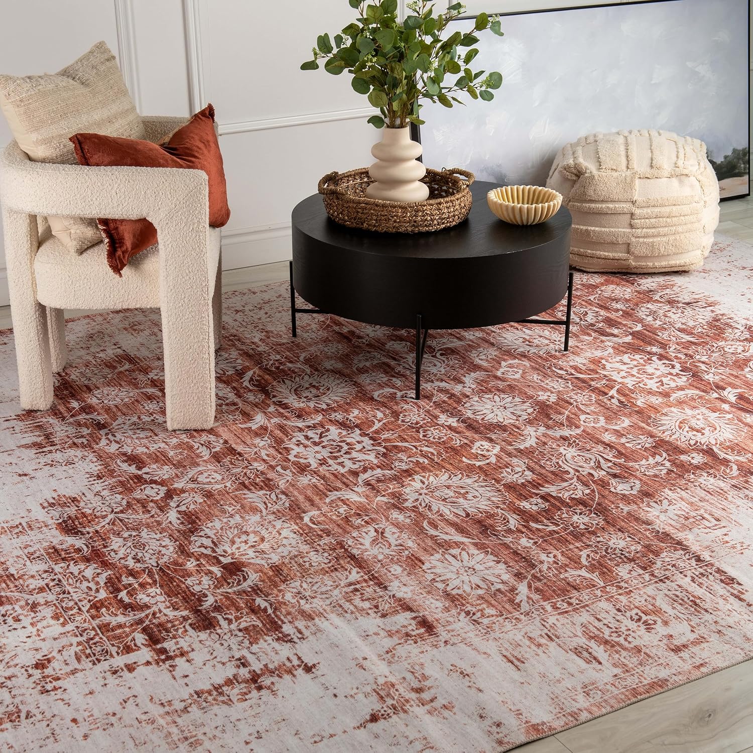 Cozy living room with red patterned rug.