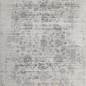 Vintage floral textured rug with intricate design.