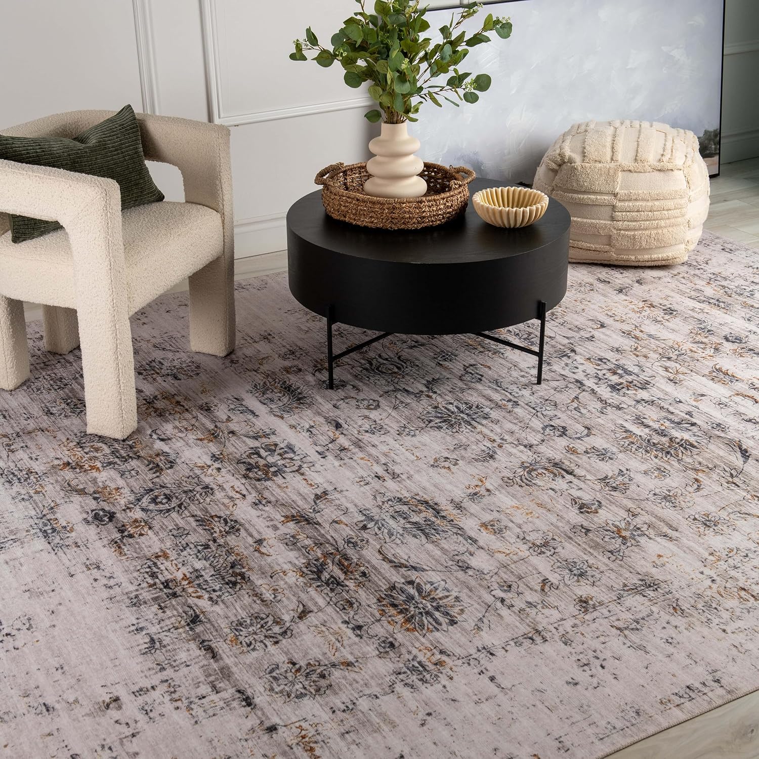 Modern living room with abstract-patterned rug.