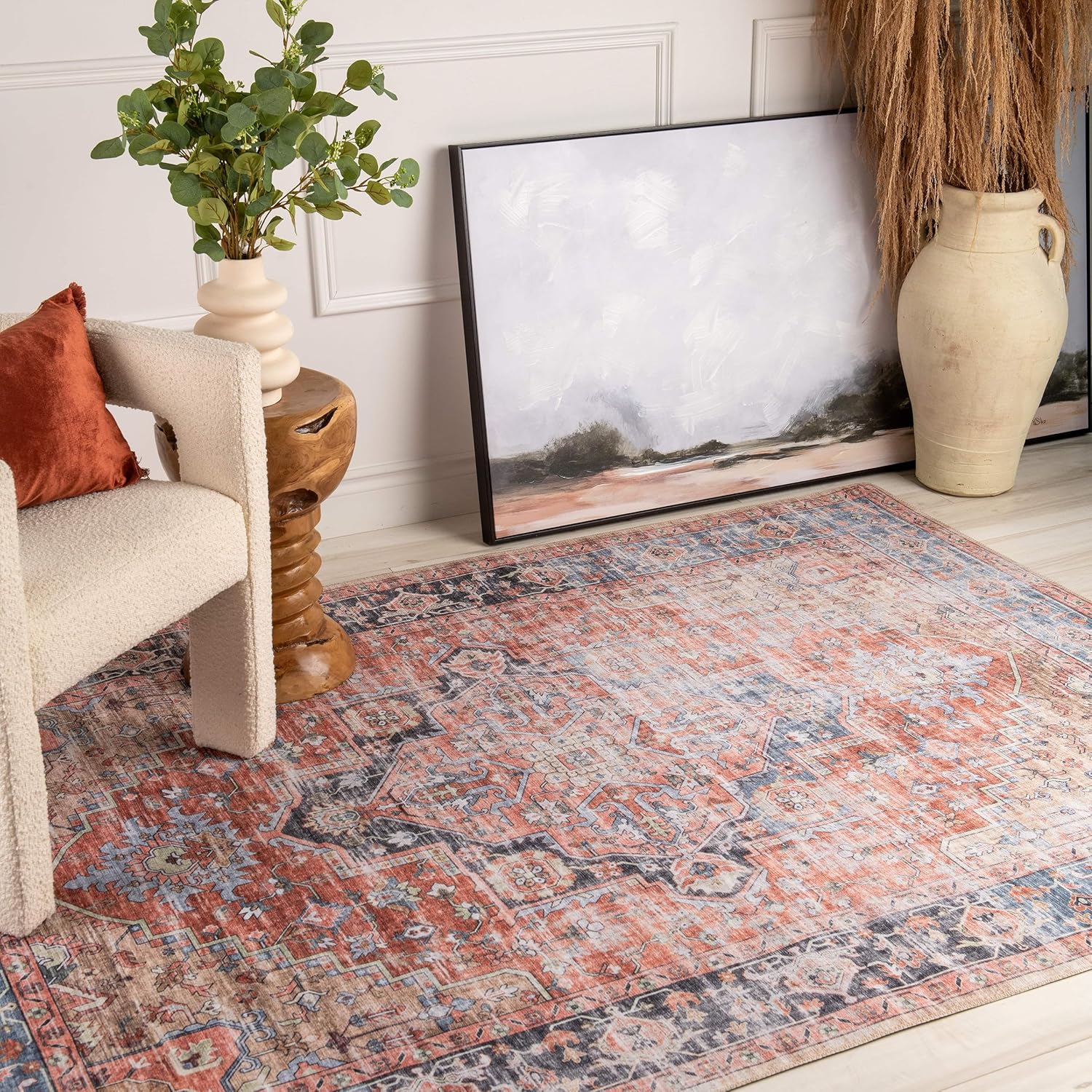 Vintage rug and decor in stylish living room.