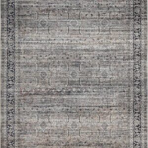 Vintage Turkish rug with intricate gray patterns.