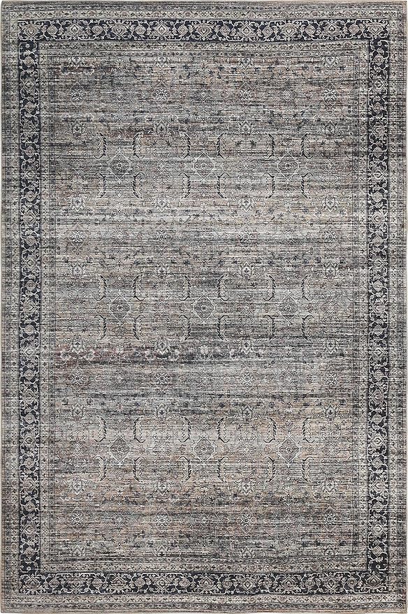 Vintage Turkish rug with intricate gray patterns.