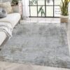 Modern living room with textured gray area rug.