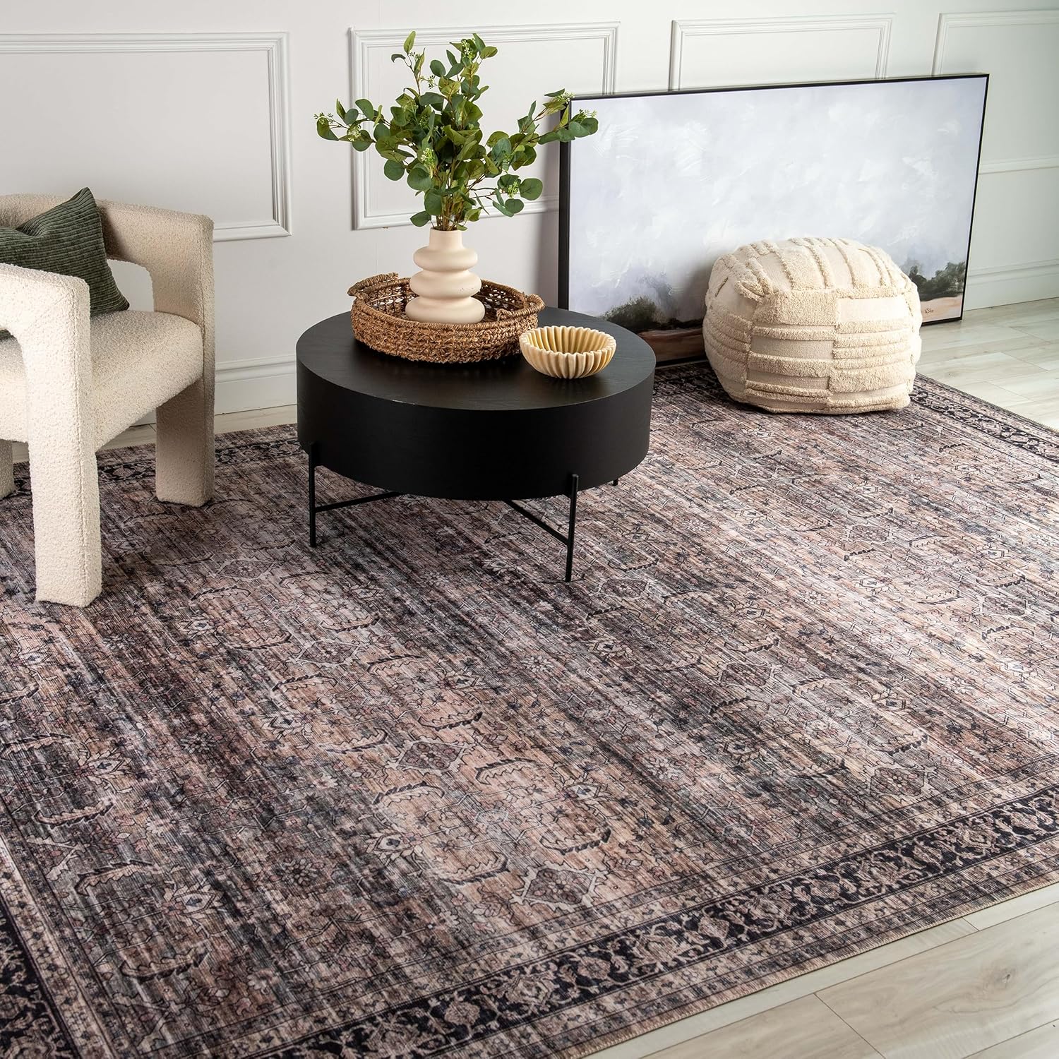 Cozy room with textured rug and modern decor.