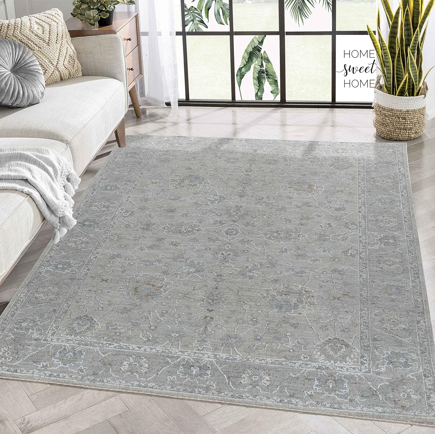 Cozy living room with patterned gray rug.