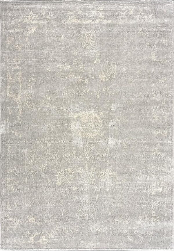 Beige vintage-style area rug with subtle floral pattern.